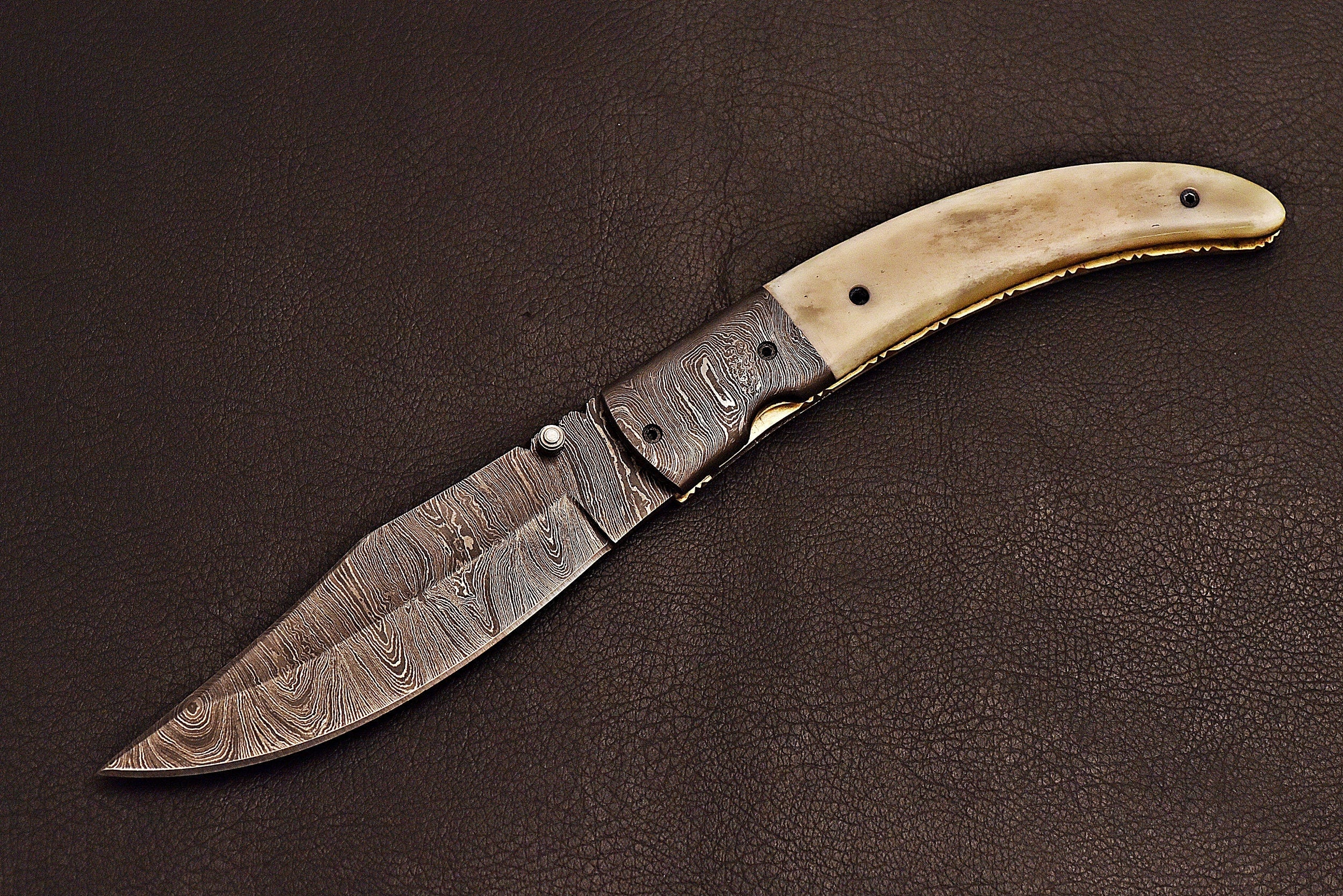 Handmade Damascus steel pocket knife with leather sheath